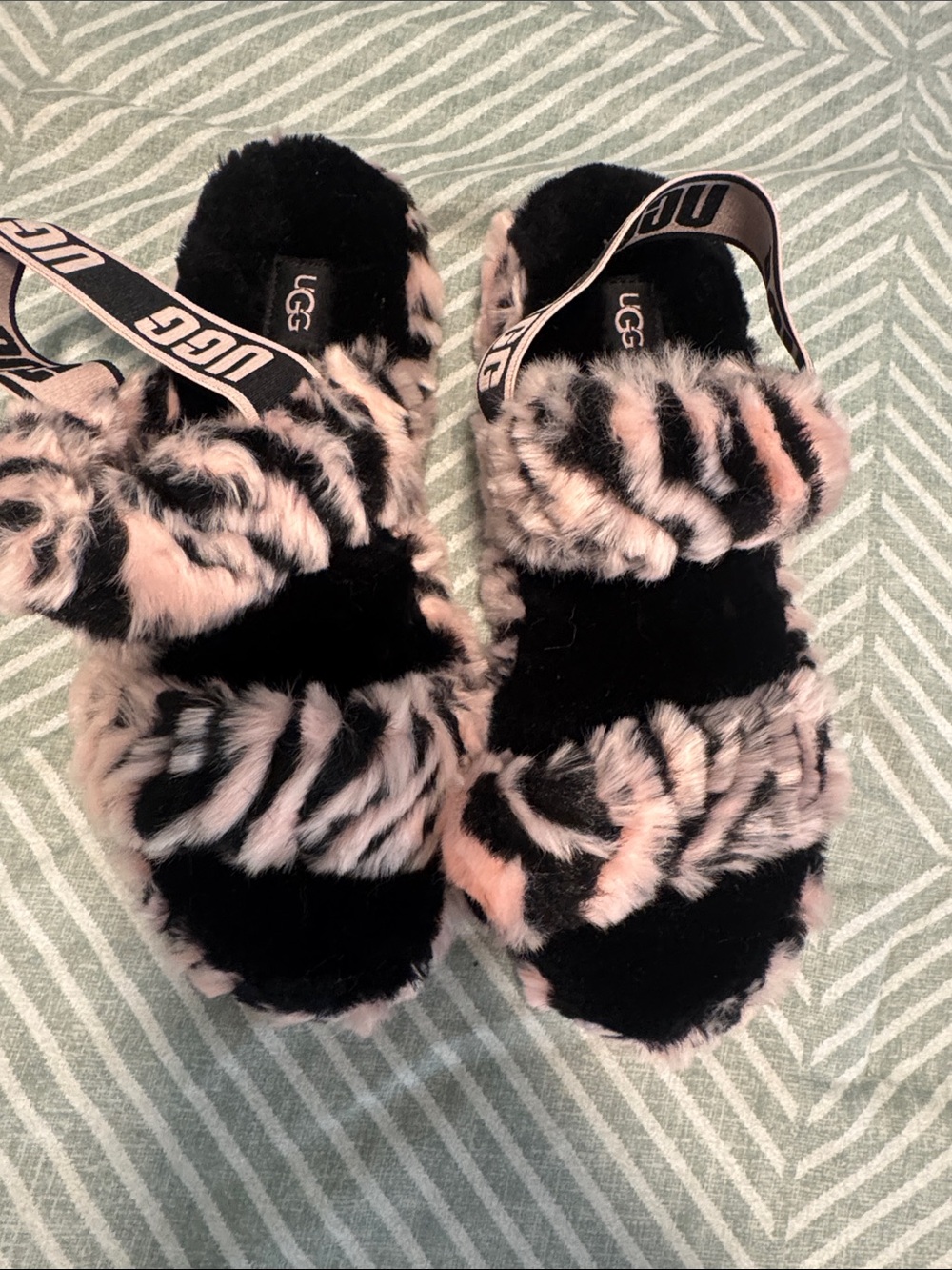 UGG Women’s Pink and Black Faux Fur Fluff Slides with Branded Sling